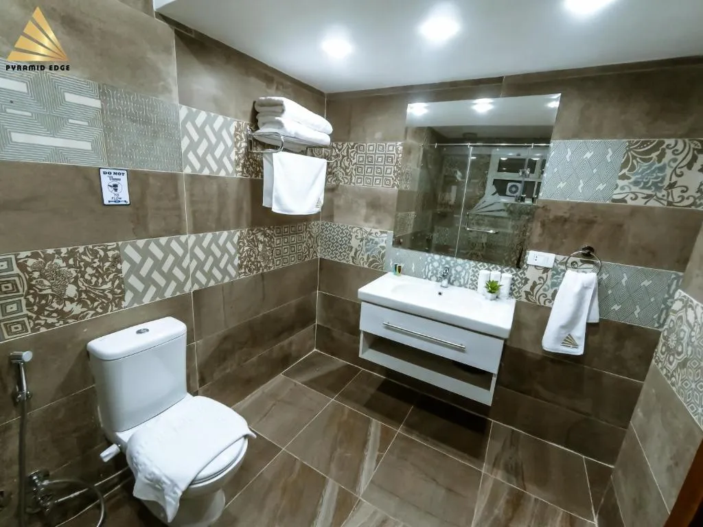 Deluxe Triple Room Pyramids View & Balcony